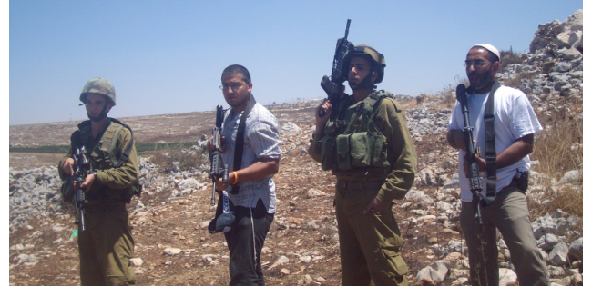 Photo: Alhaq Palestinian Abductee Confronts Israeli Settler