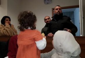 Mustafa Al-Kharouf (in the background) in the Jerusalem Magistrate Court. Photo credit: Advocate Adi Lustigman, taken from https://www.haaretz.com/israel-news/.premium-e-jerusalem-photographer-facing-deportation-to-jordan-where-he-cannot-stay-1.7025216