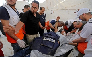 Injury of Reuters photojournalist Bassam Mas’oud, east of Khuza’a, east of Khan Younis, Gaza Strip – (c) Al-Haq 2018