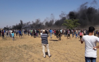 Palestinians participate in 11th week of protests as part of the Great Return March, east of Khuza’a, east of Khan Younis, on 8 June 2018 – Al-Haq (c) 2018.