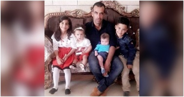 Photo of Hamdi Taleb Na’san and his four children; circulated online.